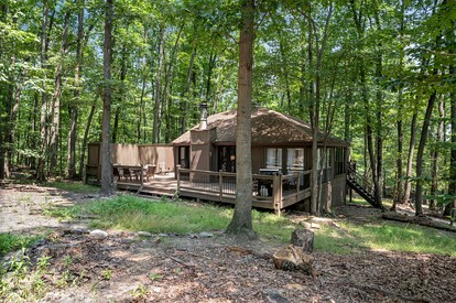 Modern Light-Filled Cabin with Fire Pit and Deck near Berkeley Springs, West Virginia - glamping.directory