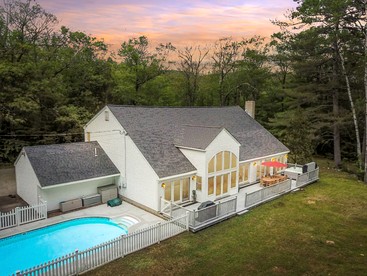 Spacious Riverfront Villa with Swimming Pool and Game Room in Bartlett, New Hampshire - glamping.directory
