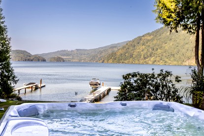 Serene Lake Whatcom Retreat with Dock & Hot Tub Near Bellingham in Sedro-Woolley, Washington - glamping.directory