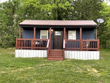 Cozy Tiny Home Cabin in Eva, TN - glamping.directory