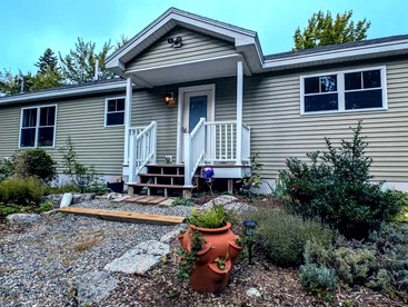 Serene Lakeside Cabin with Fire Pit, Waterfront Retreat Near Graham Lake, Mariaville Maine - glamping.directory