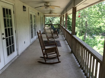 Riverfront Family Cabin Rental on the Guadalupe River near Canyon Lake and Gruene - Canyon Lake, Texas - glamping.directory